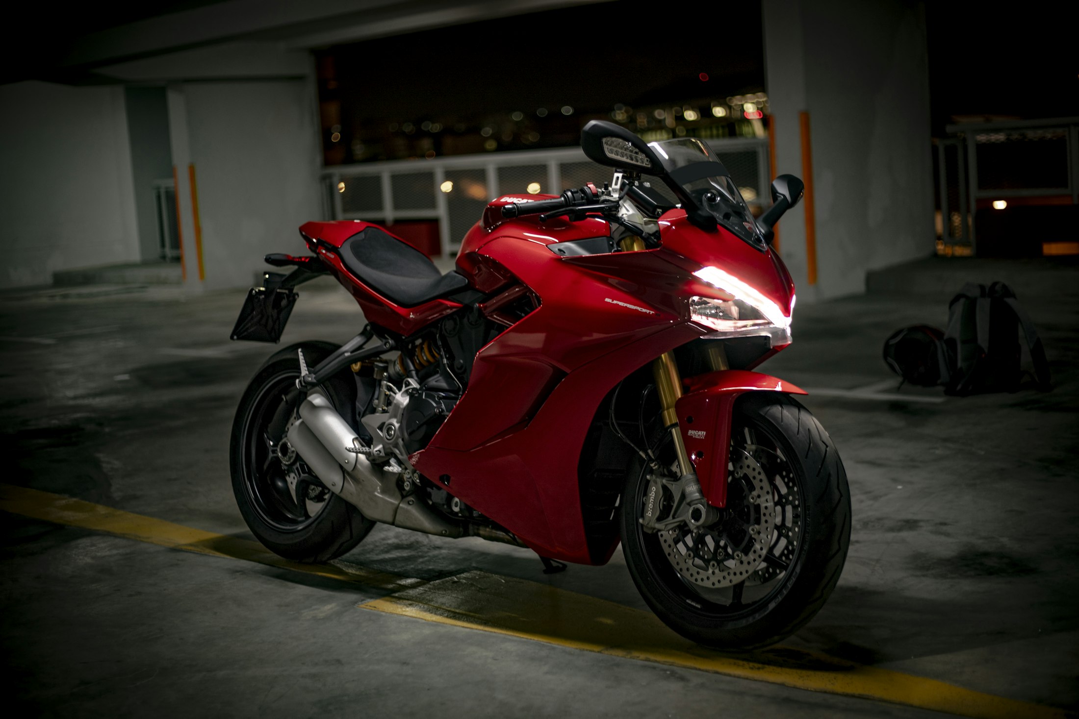 Red motorcycle in a showroom garage